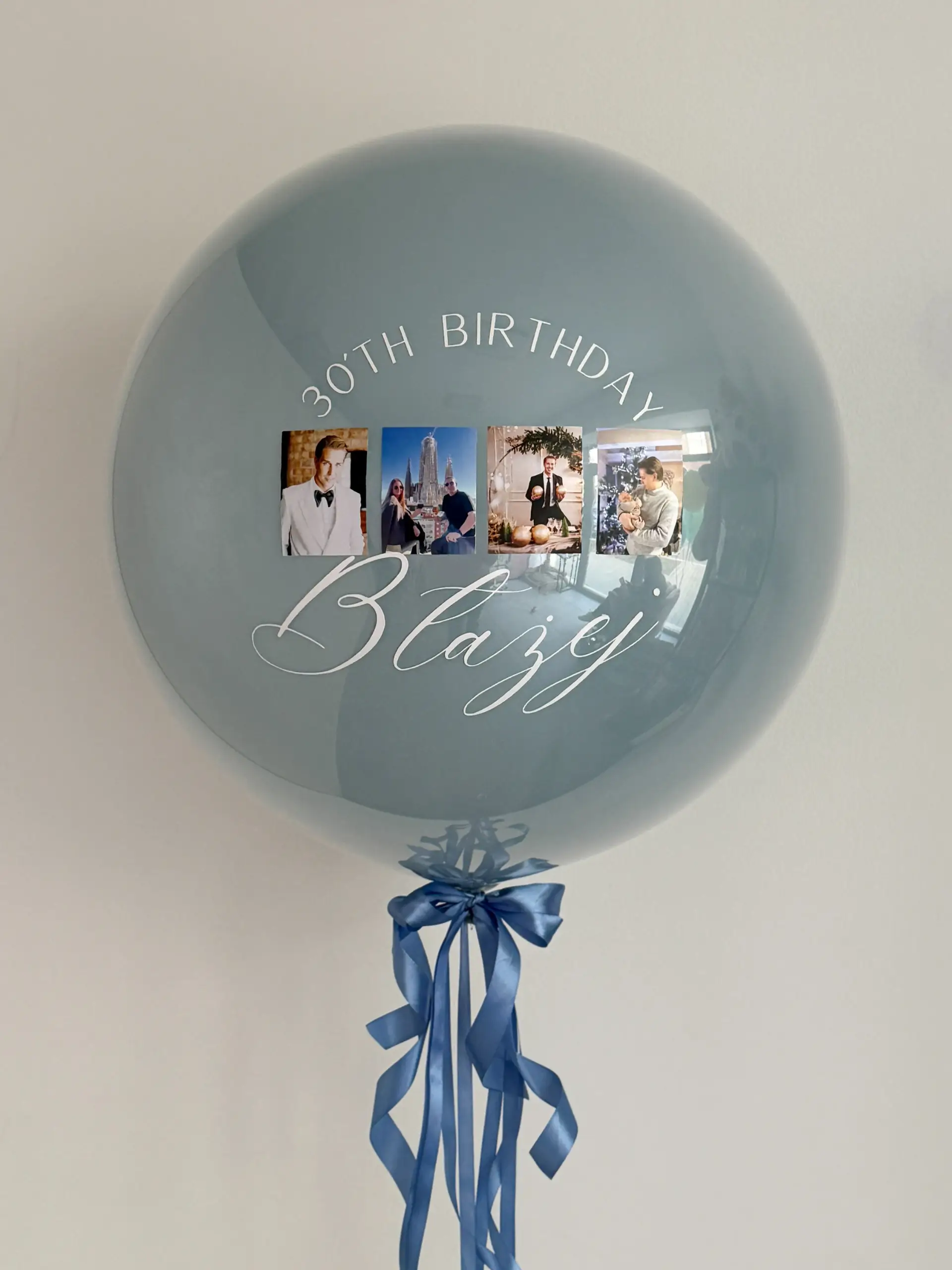 balon z napisem i zdjęciami dla niego
